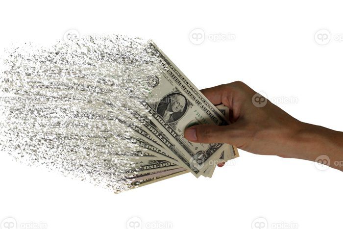 دانلود عکس گسترش ارز کاغذی دلار در دست خرج کردن