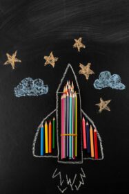 دانلود عکس ستاره های ابرها و هواپیما با مداد رنگی ترسیم شده با گچ