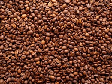 دانلود عکس از نزدیک دانه های قهوه بوداده پس زمینه نمای بالا فضای کپی