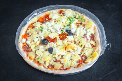 دانلود عکس پیتزا بسته بندی مواد غذایی منجمد فیلم سلفون یخ زدایی تازه