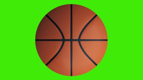 دانلود عکس توپ بسکتبال روی صفحه سبز کروماکی پس زمینه سه بعدی