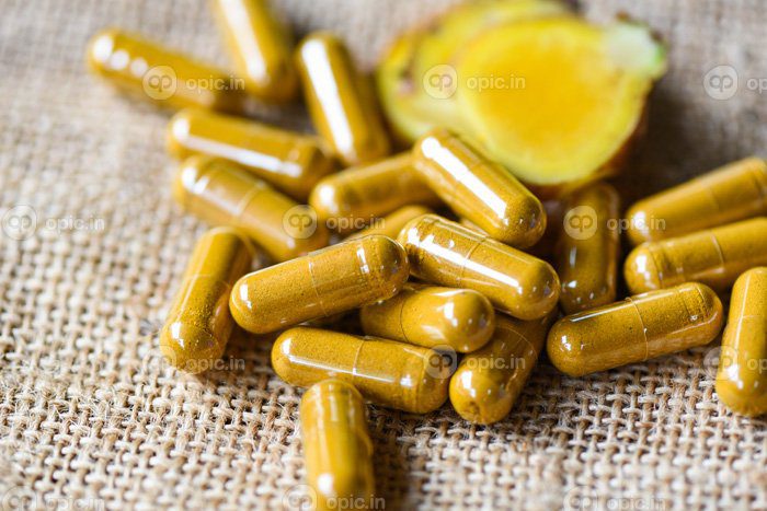 دانلود عکس کپسول گیاهی گیاهی زردچوبه شیوه زندگی سالم گیاهی