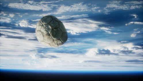 دانلود عکس توپ قدیمی فوتبال در فضا در مدار زمین