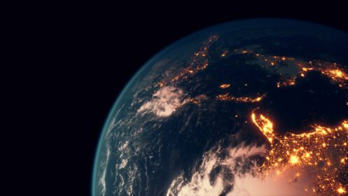 دانلود عکس سیاره زمین مشاهده شده از فضا در شب در حال نمایش نورها