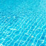 دانلود عکس توپ بسکتبال روی صفحه سبز کروماکی پس زمینه سه بعدی