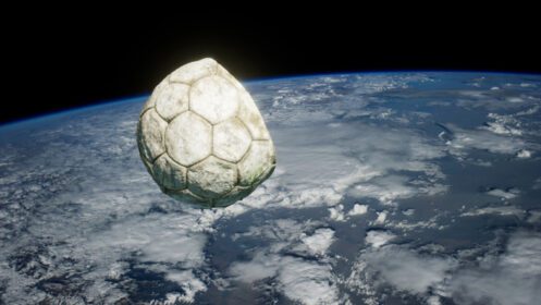 دانلود عکس توپ قدیمی فوتبال در فضا در مدار زمین