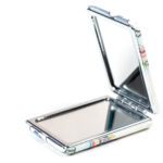 دانلود عکس فنجان قهوه پر از دانه های قهوه