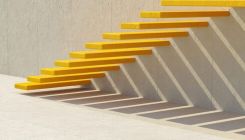 دانلود عکس انتزاعی از پله های سیمانی زرد روی دیوار خاکستری با رندر سه بعدی سایه تراز