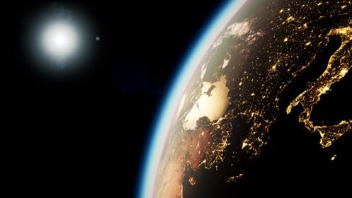 دانلود عکس فضایی خورشید و سیاره زمین در شب