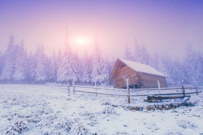 دانلود عکس غروب خورشید در کوه های زمستانی