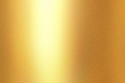 دانلود عکس نور تابیده بر دیوار فلزی طلایی رنگ شده با فضای کپی