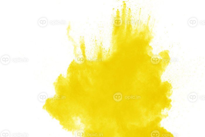 دانلود عکس انفجار ذرات گرد و غبار زرد در زمینه سفید زرد